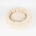 Cream plush donut dog bed